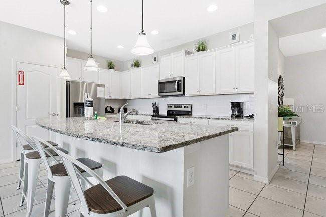 5 bedroom Townhouse at 8904 Sydney Avenue, Windsor At Westside; Windsor/Westside, Kissimmee — photo 5