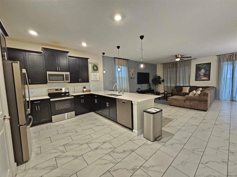 7 bedroom Single Family Residence at 1241 Challenge Drive, Stoneybrook South North Prcl Ph 5, Davenport — photo 5