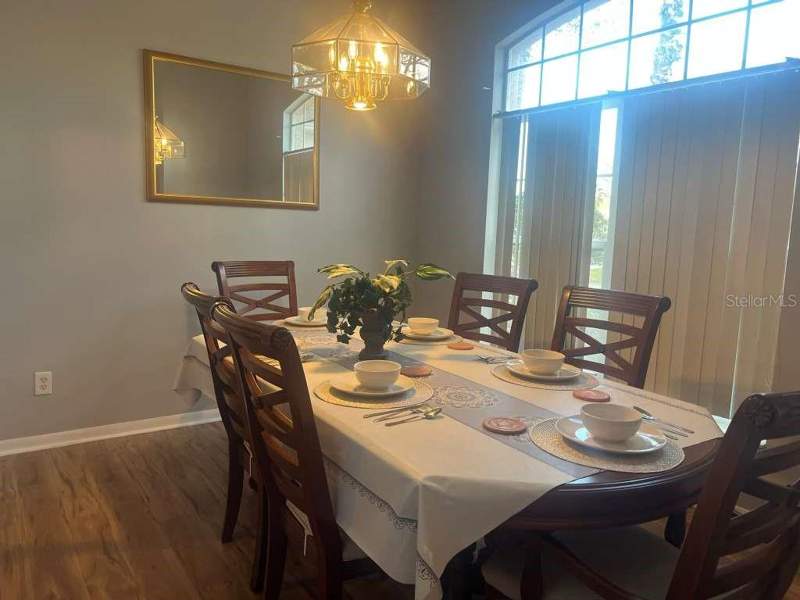 5 bedroom Single Family Residence at 115 Castlemain Circle, Hampton Estates, Davenport — photo 2