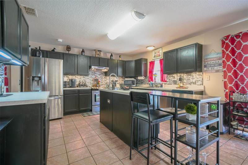 4 bedroom Single Family Residence at 613 Lobelia Drive, Holly Hill Estates, Davenport — photo 5