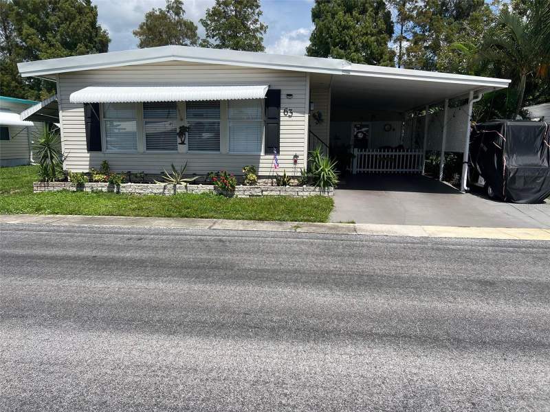 2 bedroom Manufactured Home at 63 ROYAL PALM CIRCLE, PALM HILL MOBILE HOME PARK UNREC, LARGO — photo 1