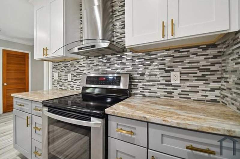 4 bedroom Single Family Residence at 6745 Ralston Beach Circle, Ralston Beach Manor Unit 3, Tampa — photo 5