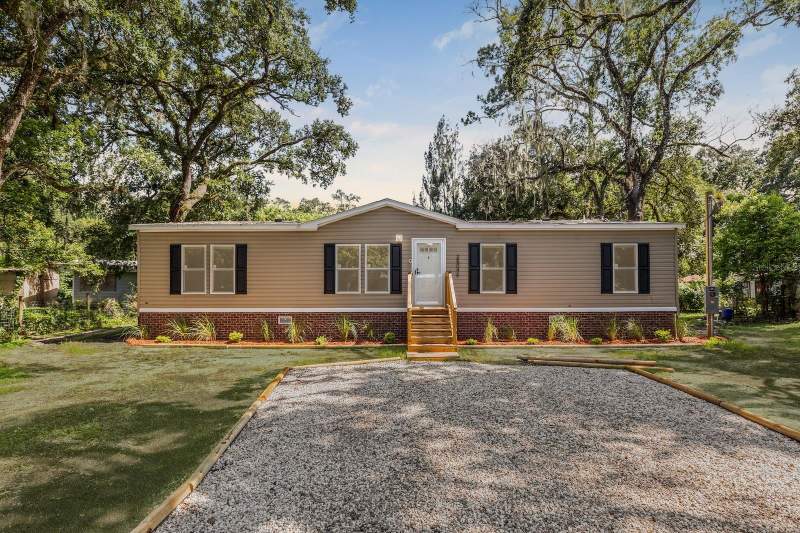 4 bedroom Manufactured Home at 25046 CELESTIAL STREET, CHRISTMAS PARK FIRST ADD, CHRISTMAS — photo 1