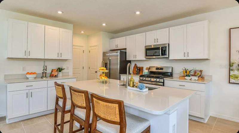 4 bedroom Single Family Residence at 13844 Shellmore Avenue, Cove At Coasterra, Palmetto — photo 2