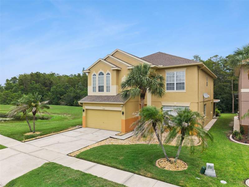 5 bedroom Single Family Residence at 1860 WHITE HERON BAY CIRCLE, HERON BAY AT MEADOW WOODS 44/54, ORLANDO — photo 2