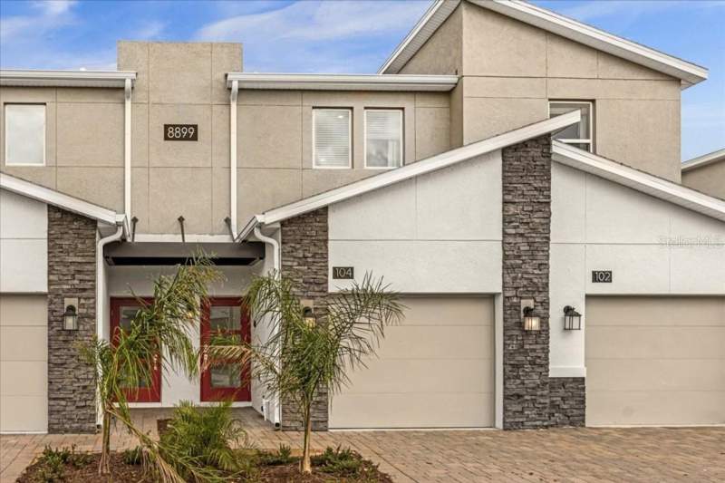 3 bedroom Condominium at 8899 CABOT CLIFFS DRIVE #104, CHAMPIONSGATE CONDO 4 PH 21, DAVENPORT — photo 1