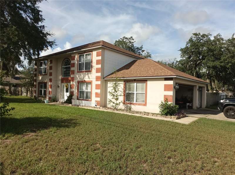 4 bedroom Single Family Residence at 1025 Humphrey Boulevard, Deltona Lakes Unit 44, Deltona — photo 3