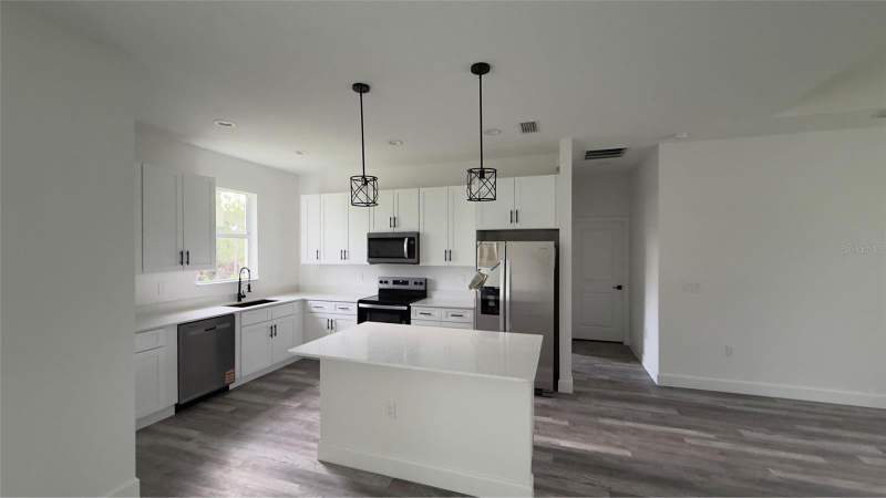 4 bedroom Single Family Residence at 8040 Agate Street, Port Charlotte Sec 058, Port Charlotte — photo 2
