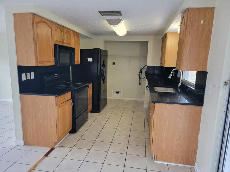 3 bedroom Single Family Residence at 22353 Buffalo Avenue, Port Charlotte Sec 007, Port Charlotte — photo 2