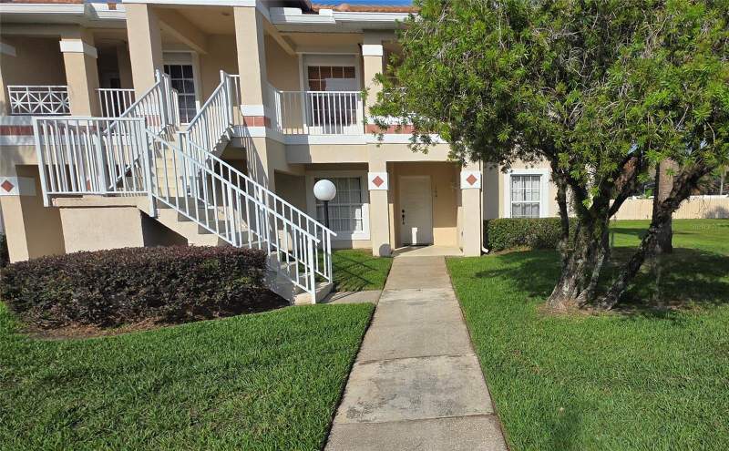 3 bedroom Condominium at 13313 FAIRWAY GLEN DRIVE #104, FAIRWAY GLEN AT MEADOW WOODS CONDO, ORLANDO — photo 1