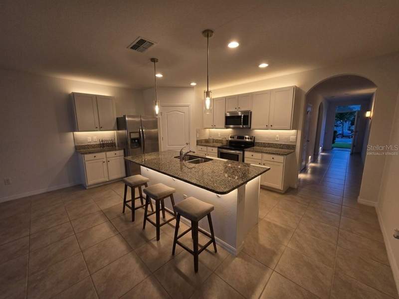 4 bedroom Single Family Residence at 2487 White Lilly Drive, Murano At Westside, Kissimmee — photo 2