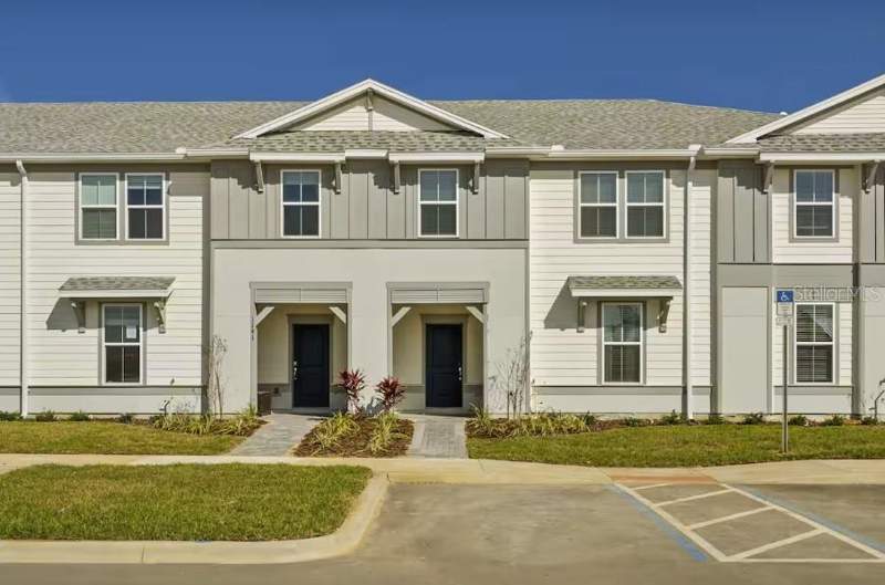 5 bedroom Townhouse at 1145 BLUE ISLAND DRIVE, WINDSOR CAY PH 1, CLERMONT — photo 1