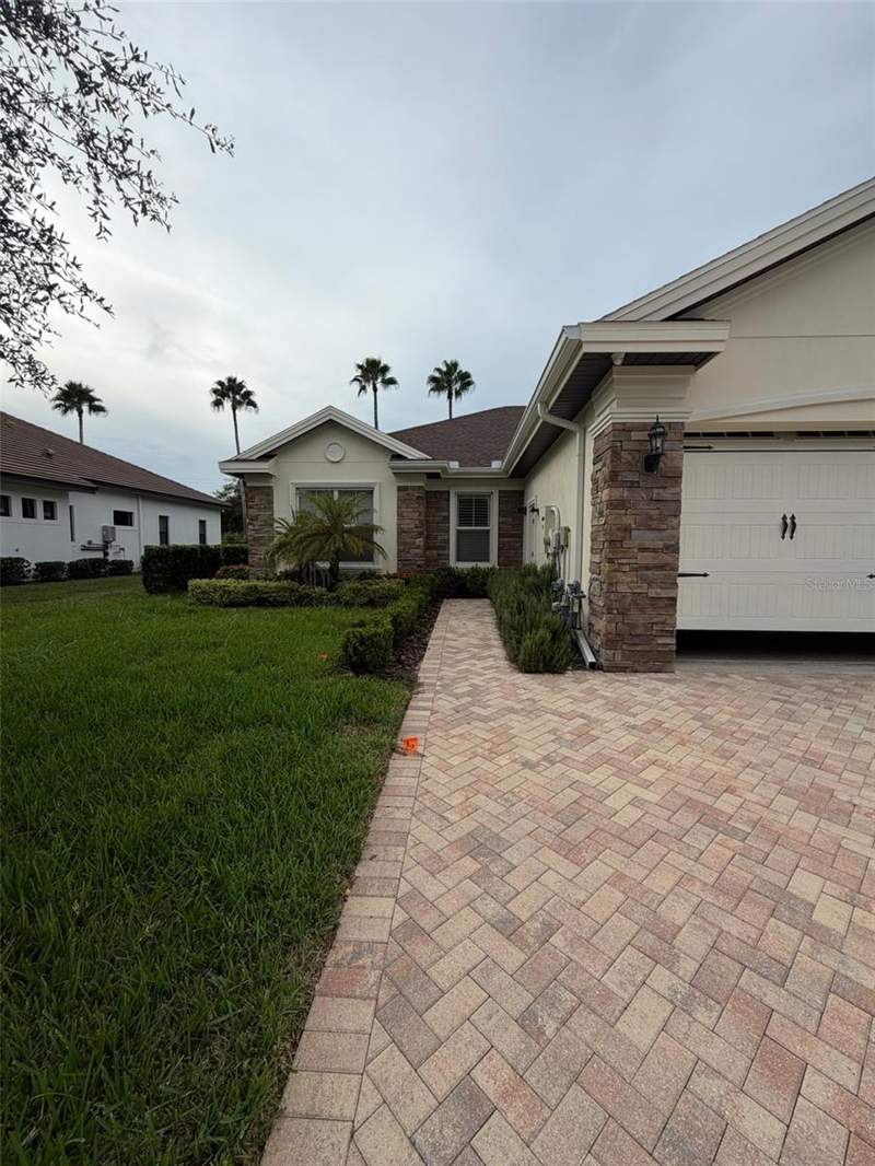 5 bedroom Single Family Residence at 9650 Milano Drive, Florencia At Champions Club, New Port Richey — photo 4