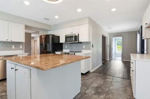 303 Barstow Court, Sun City Center FL - photo 22 of 60