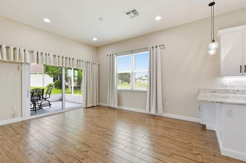 1097 Caravan Loop, Polk City FL - photo 10 of 59