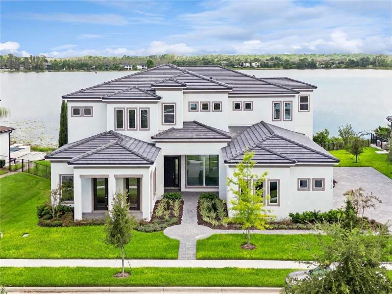6 bedroom Single Family Residence at 14168 LARKSPUR LAKE DRIVE, SHOREFRONT COVE AT HORIZON WEST, WINTER GARDEN — photo 1