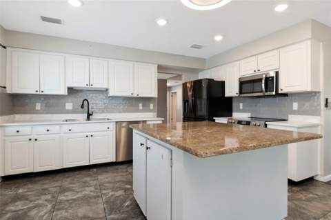 303 Barstow Court, Sun City Center FL - photo 21 of 60