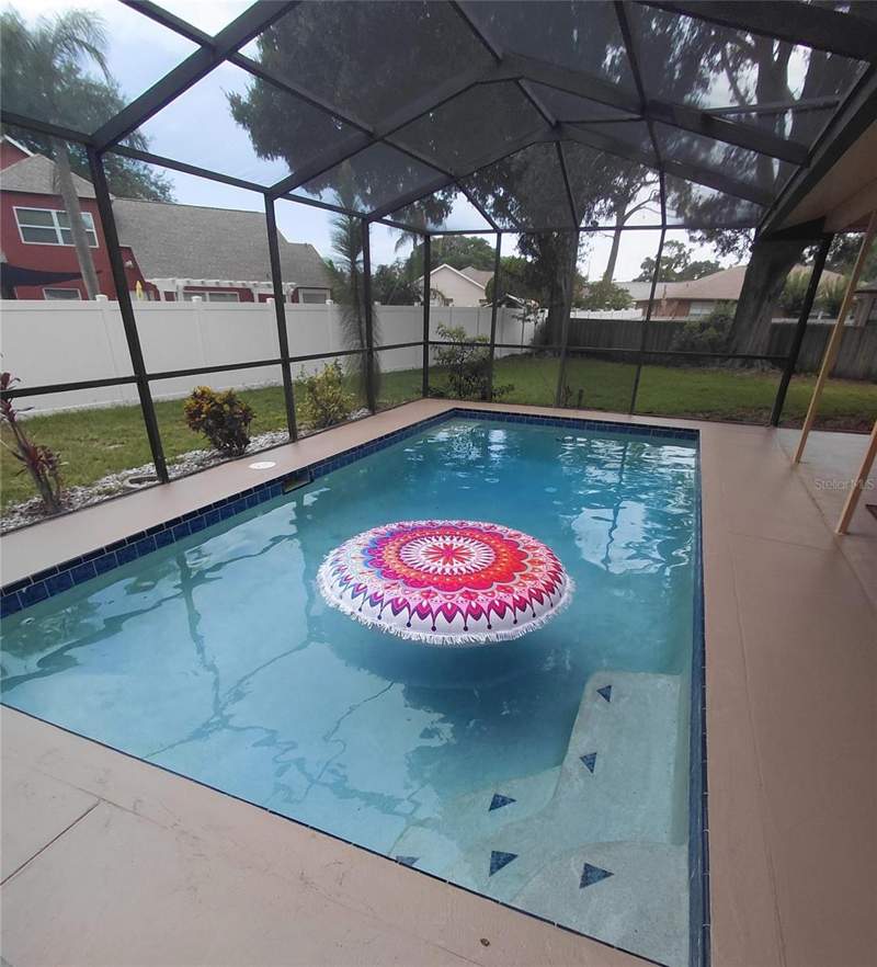 4 bedroom Single Family Residence at 5509 Gannett Court, River Crossing, New Port Richey — photo 2