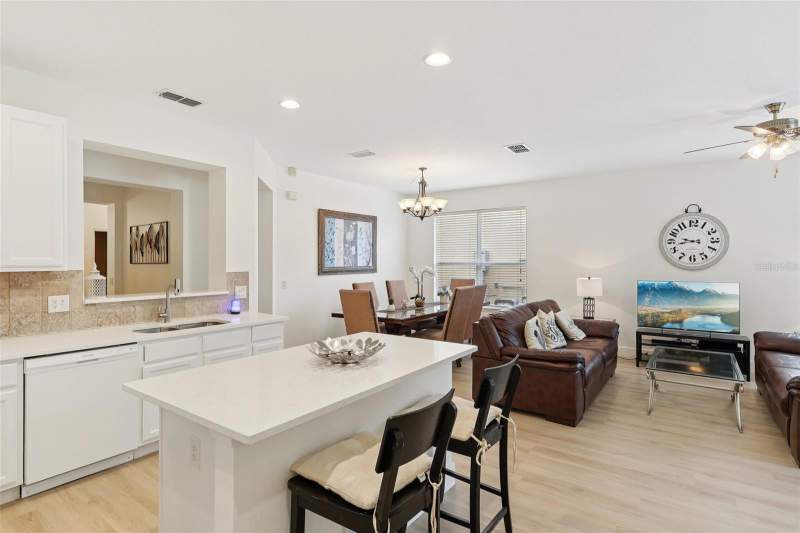 4 bedroom Single Family Residence at 334 Orange Cosmos Boulevard, Watersong Ph 01, Davenport — photo 5