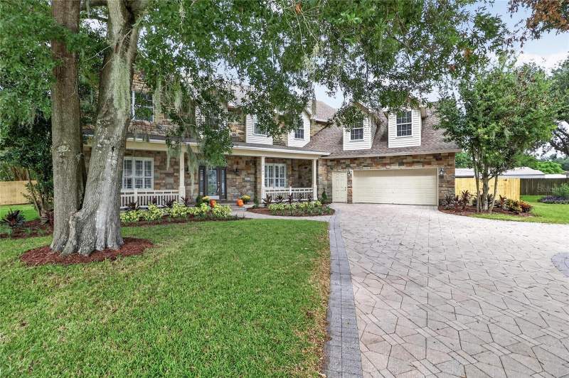 4 bedroom Single Family Residence at 7103 Twelve Oaks Drive, Twelve Oaks, Lakeland — photo 2