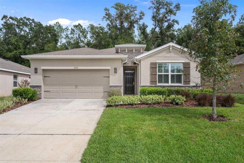 12735 EASTPOINTE DRIVE home for sale in Lake Jovita Golf & Country Club