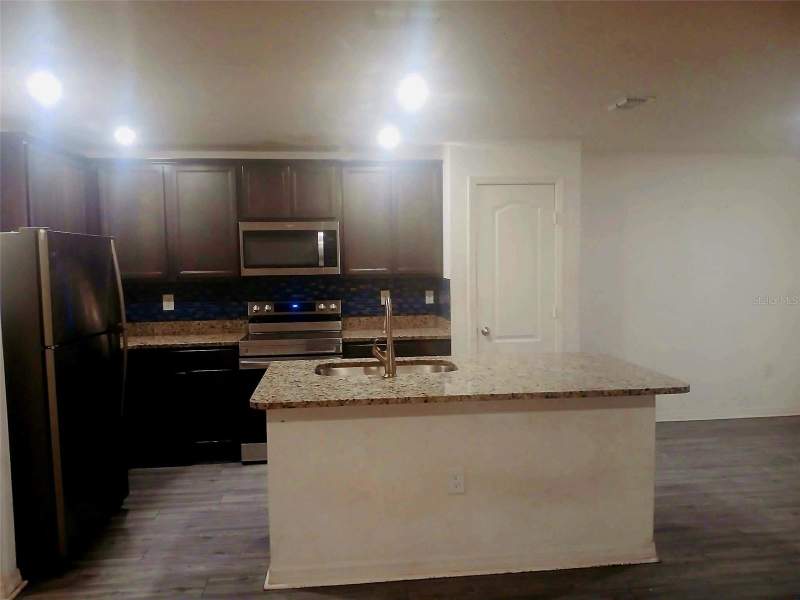 3 bedroom Single Family Residence at 707 Caracara Court, Poinciana Nbrhd 05 North Village 03, Poinciana — photo 2