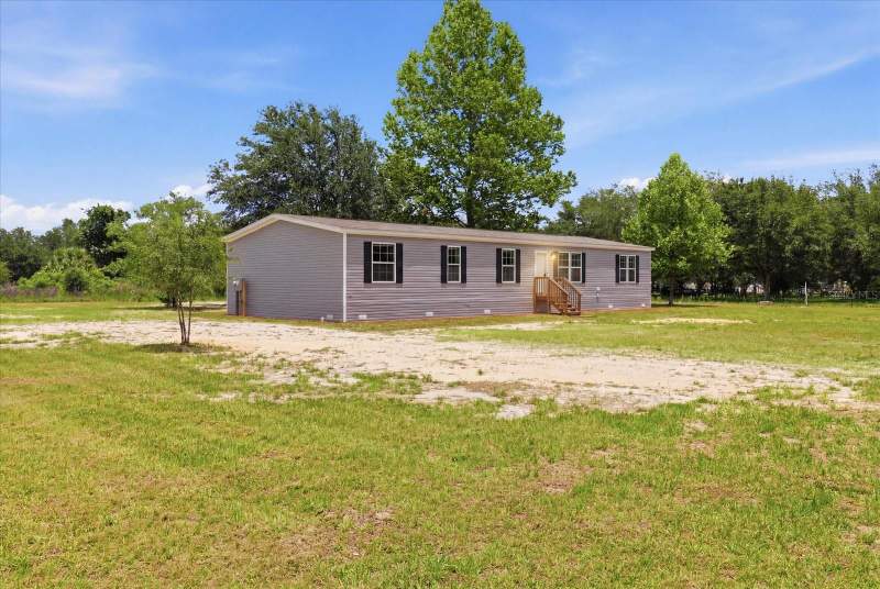 5 bedroom Manufactured Home at 11975 NE 227th Place, Alicia Acres, Fort Mc Coy — photo 4