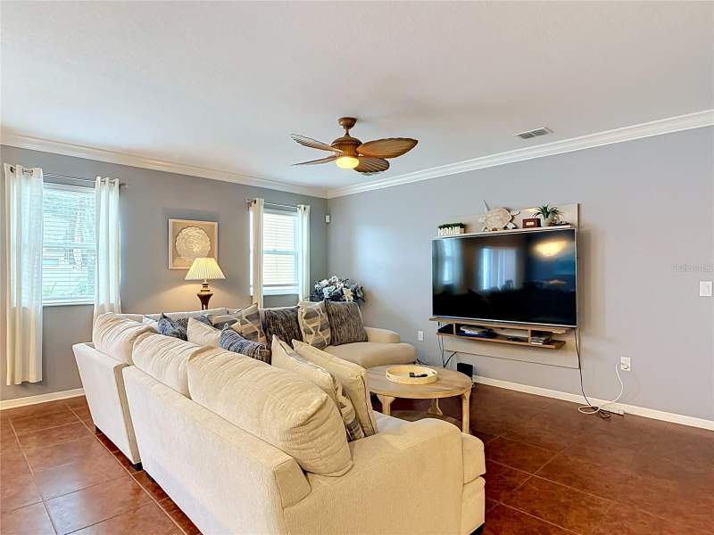 4 bedroom Single Family Residence at 141 W Fiesta Key Loop, Mallory Square-Phase I, Deland — photo 4