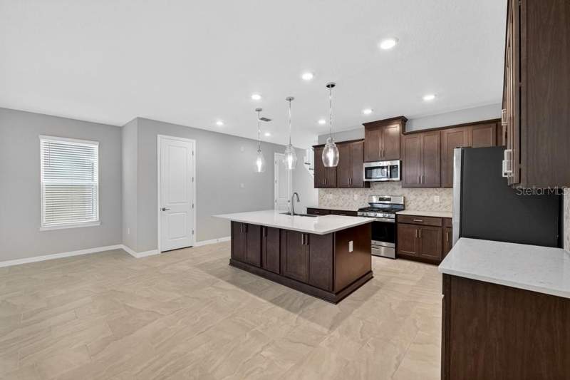 4 bedroom Single Family Residence at 5166 Goldfinch Drive, The Waters At Center Lake Ranch, St Cloud — photo 5