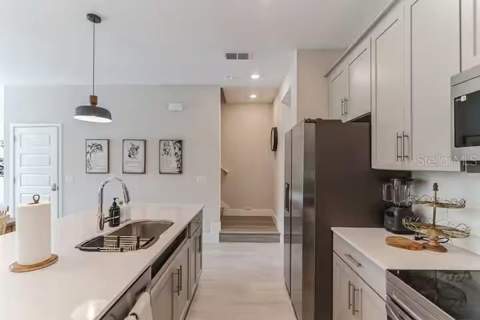 7842 Spectrum Drive, Reunion FL - photo 10 of 31