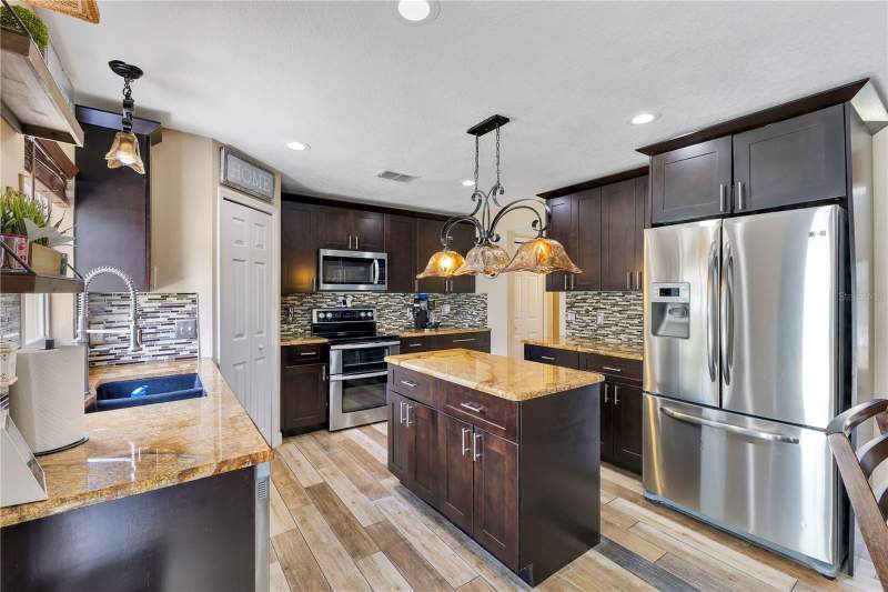 5 bedroom Single Family Residence at 5051 PLYMOUTH TURTLE CIRCLE, SOUTHERN PINES UNIT 1, ST CLOUD — photo 5