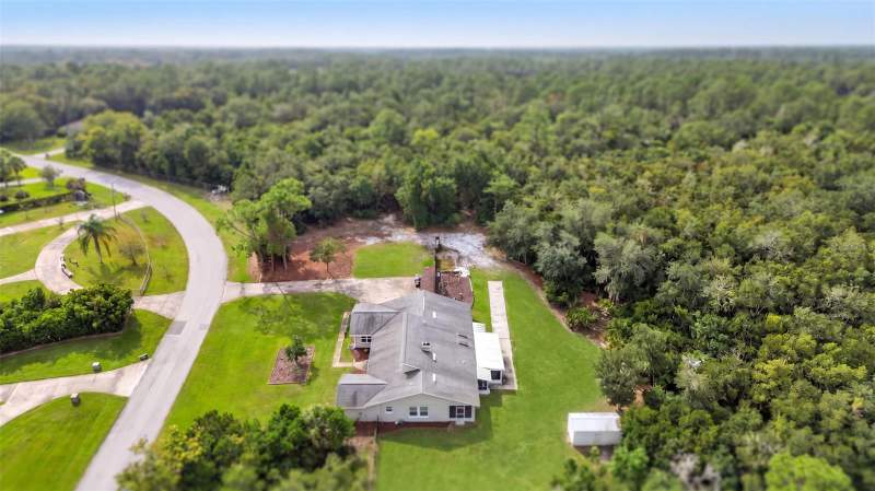 5 bedroom Single Family Residence at 650 W Lorraine Drive, Deltona Lakes Unit 11, Deltona — photo 4