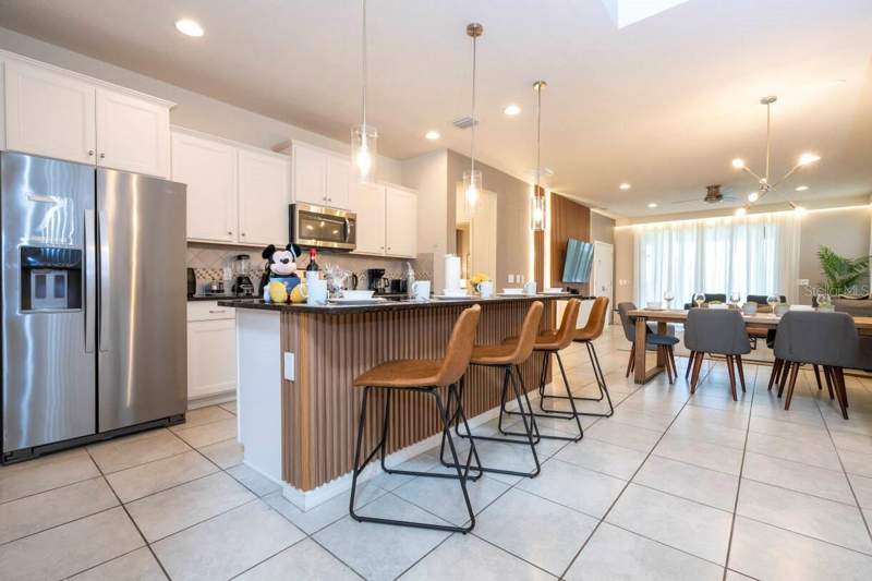 6 bedroom Single Family Residence at 9013 Rhodes Street, Windsor At Westside Ph 1, Kissimmee — photo 5