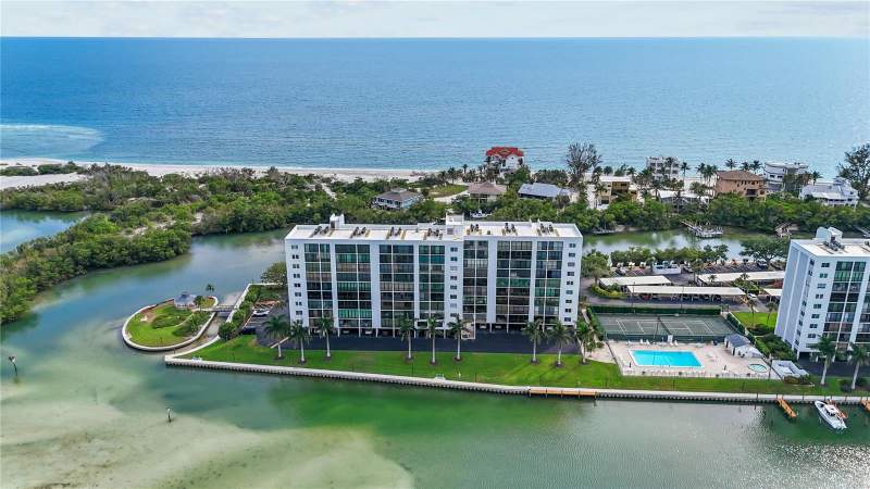 9397 MIDNIGHT PASS ROAD #903 home for sale in Pointe on Midnight Pass Condos for Sale: Median $504K