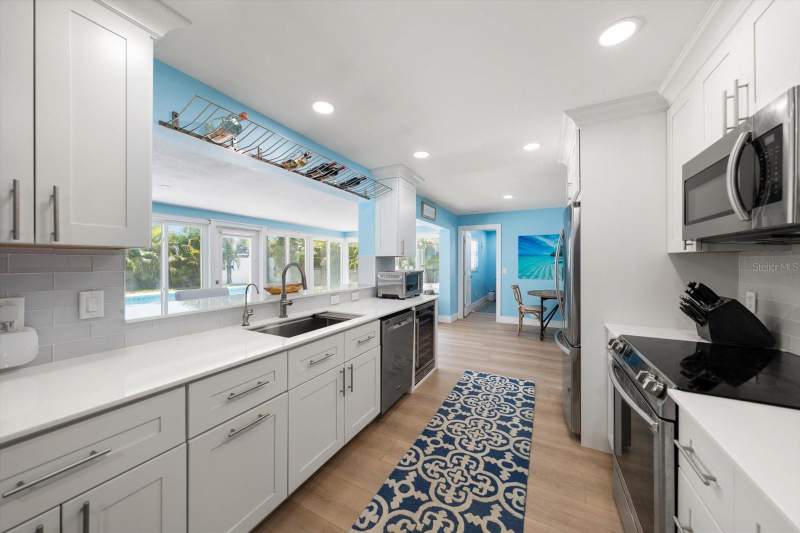 4 bedroom Single Family Residence at 991 MCLEAN STREET, PINEHURST HIGHLANDS, DUNEDIN — photo 5