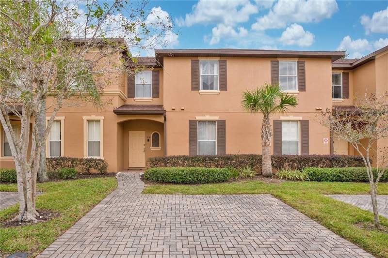 4 bedroom Townhouse at 219 MIRAMAR AVENUE, REGAL PALMS AT HIGHLAND RESERVE, DAVENPORT — photo 1