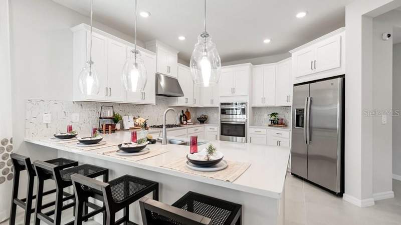 4 bedroom Single Family Residence at 13514 Rowhouse Court, Firethorn, Parrish — photo 2
