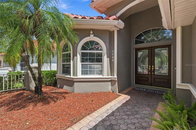5 bedroom Single Family Residence at 9871 Sago Point Drive, Bayou Club Estates Tr 5 Ph 3, Seminole — photo 1