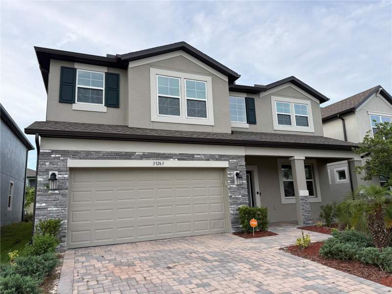 5 bedroom Single Family Residence at 33263 Sycamore Leaf Drive, Whispering Oaks Preserve Ph 1, Wesley Chapel — photo 3