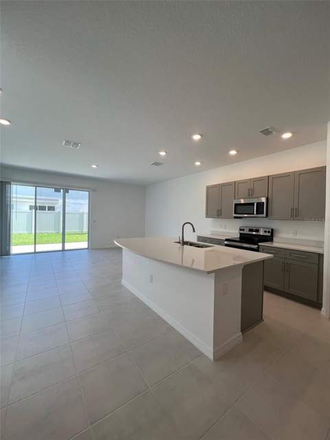 4553 Teoli Court, Kissimmee FL - photo 7 of 37