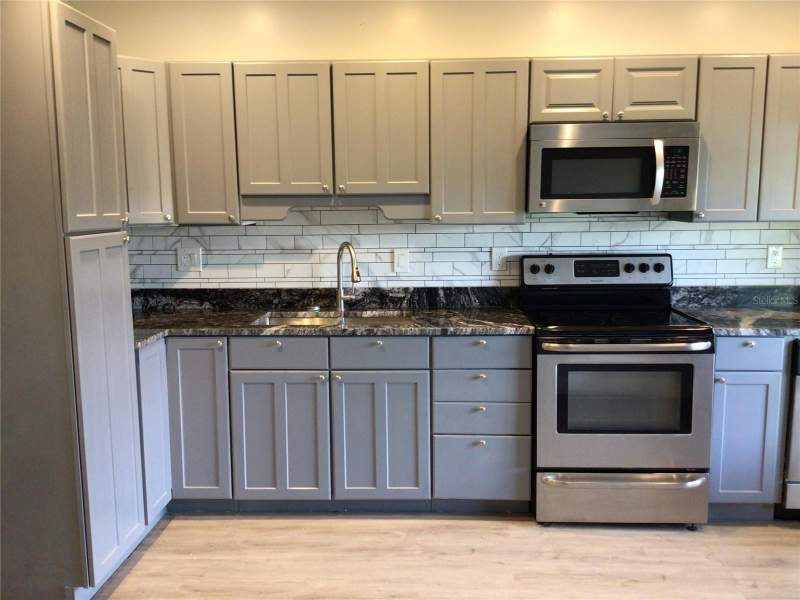 4 bedroom Single Family Residence at 1010 Dakota Avenue, St Cloud 2nd Town Of, St Cloud — photo 3