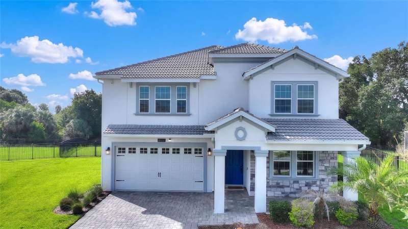 5 bedroom Single Family Residence at 1455 OLYMPIC CLUB BOULEVARD, STONEYBROOK SOUTH TR K, CHAMPIONS GATE — photo 1