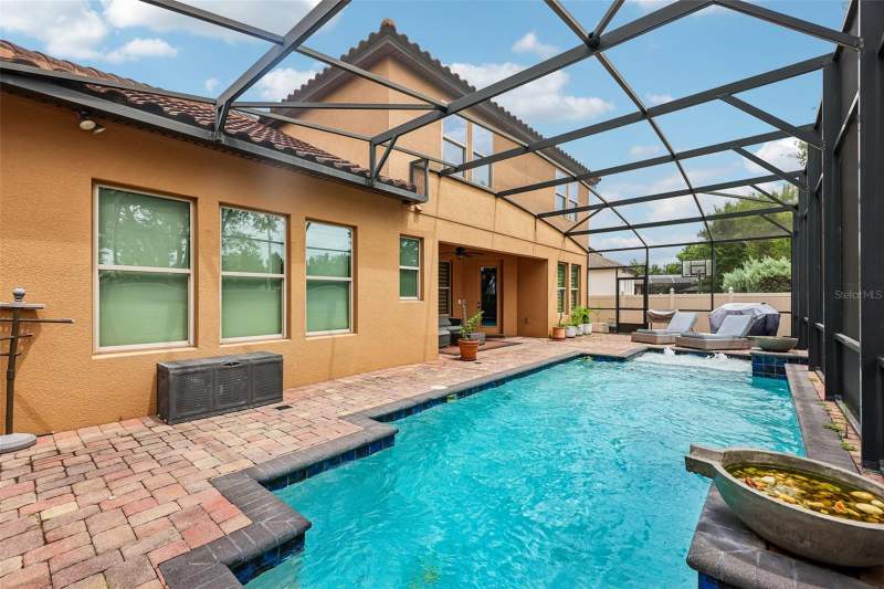 5 bedroom Single Family Residence at 9117 Outlook Rock Trail, Windermere Trls Ph 5A, Windermere — photo 4