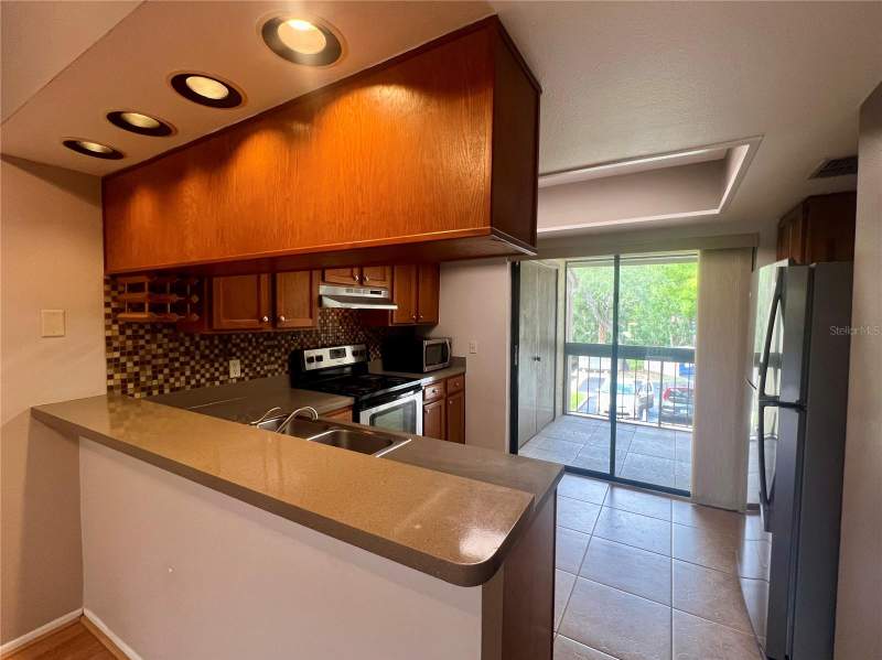2 bedroom Condominium at 142 Woodlake Wynde #48, East Lake Woodlands Woodlake Run, Oldsmar — photo 3
