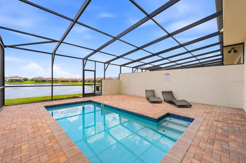 5 bedroom Townhouse at 8866 Geneve Court, Windsor At Westside Ph 2B, Kissimmee — photo 2