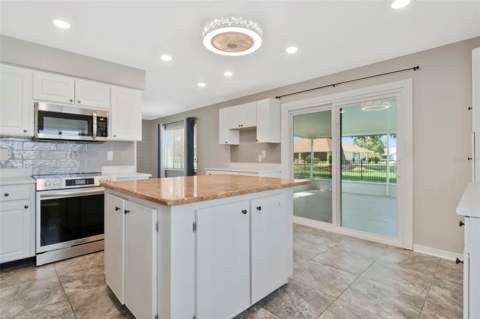 303 Barstow Court, Sun City Center FL - photo 23 of 60