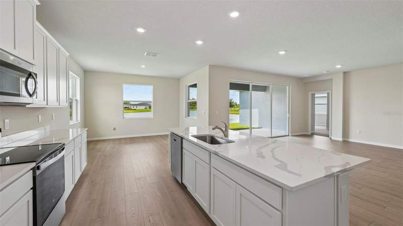 4 bedroom Single Family Residence at 10429 Woodland Garden Way, Oakfield Trails, Parrish — photo 5