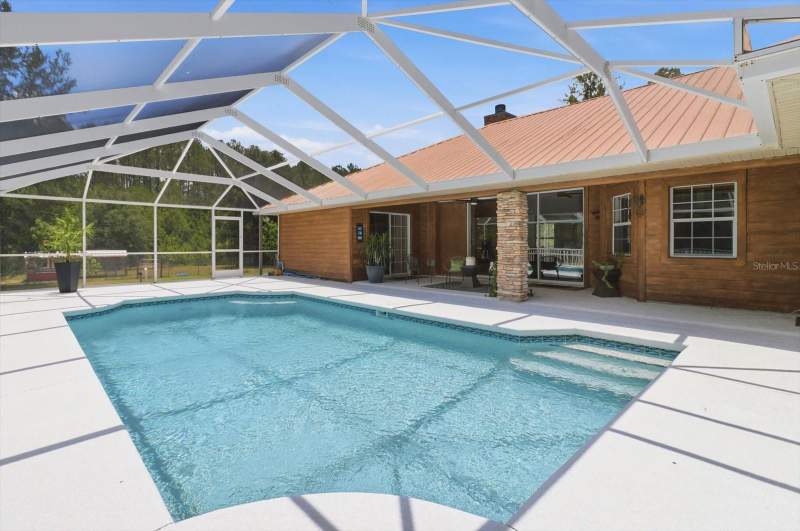 4 bedroom Single Family Residence at 12143 NE 47th Place, Grahamville 02, Silver Springs — photo 2