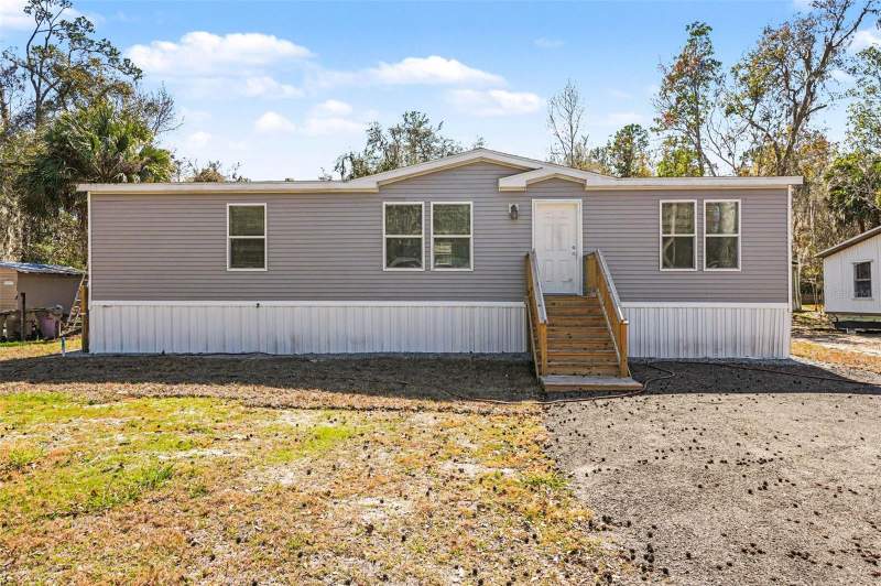 23950 BASS ROAD home for sale in Astor Forest Campsites Unrec