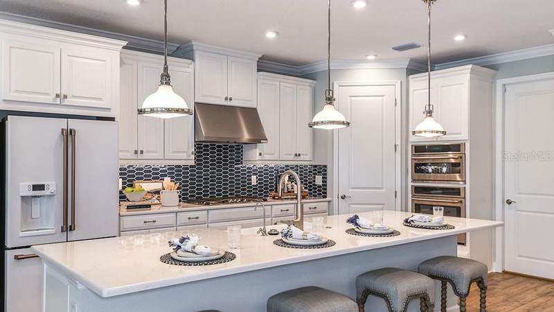 5 bedroom Single Family Residence at 969 LADYFISH TRAIL, THE WATERS AT CENTER LAKE RANCH, ST CLOUD — photo 5